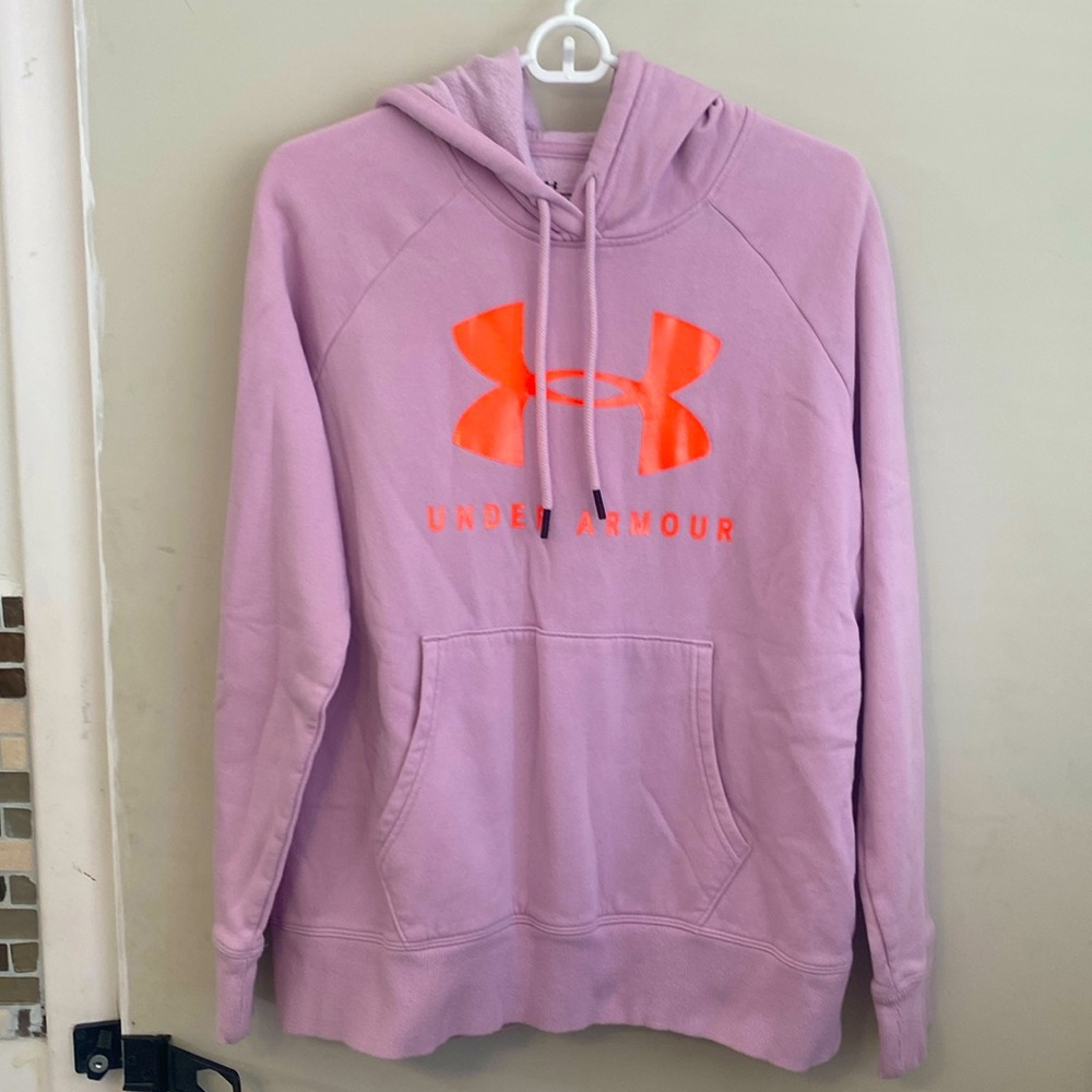Under Armour, pink hoodie with pockets in front.